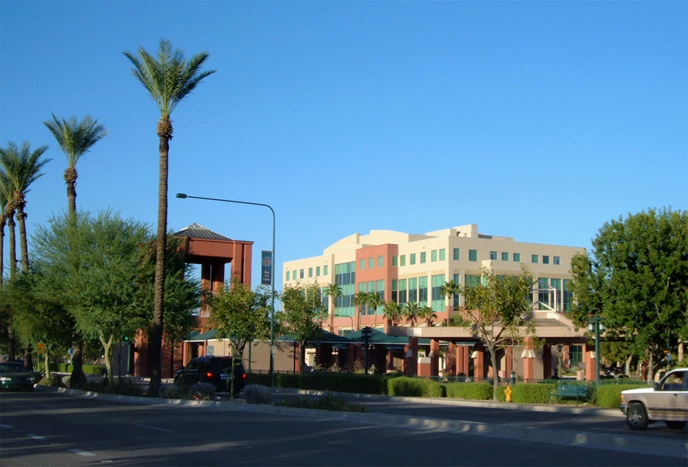 Downtown Chandler, Arizona streetscape with palm trees and storefronts in the city's historic core