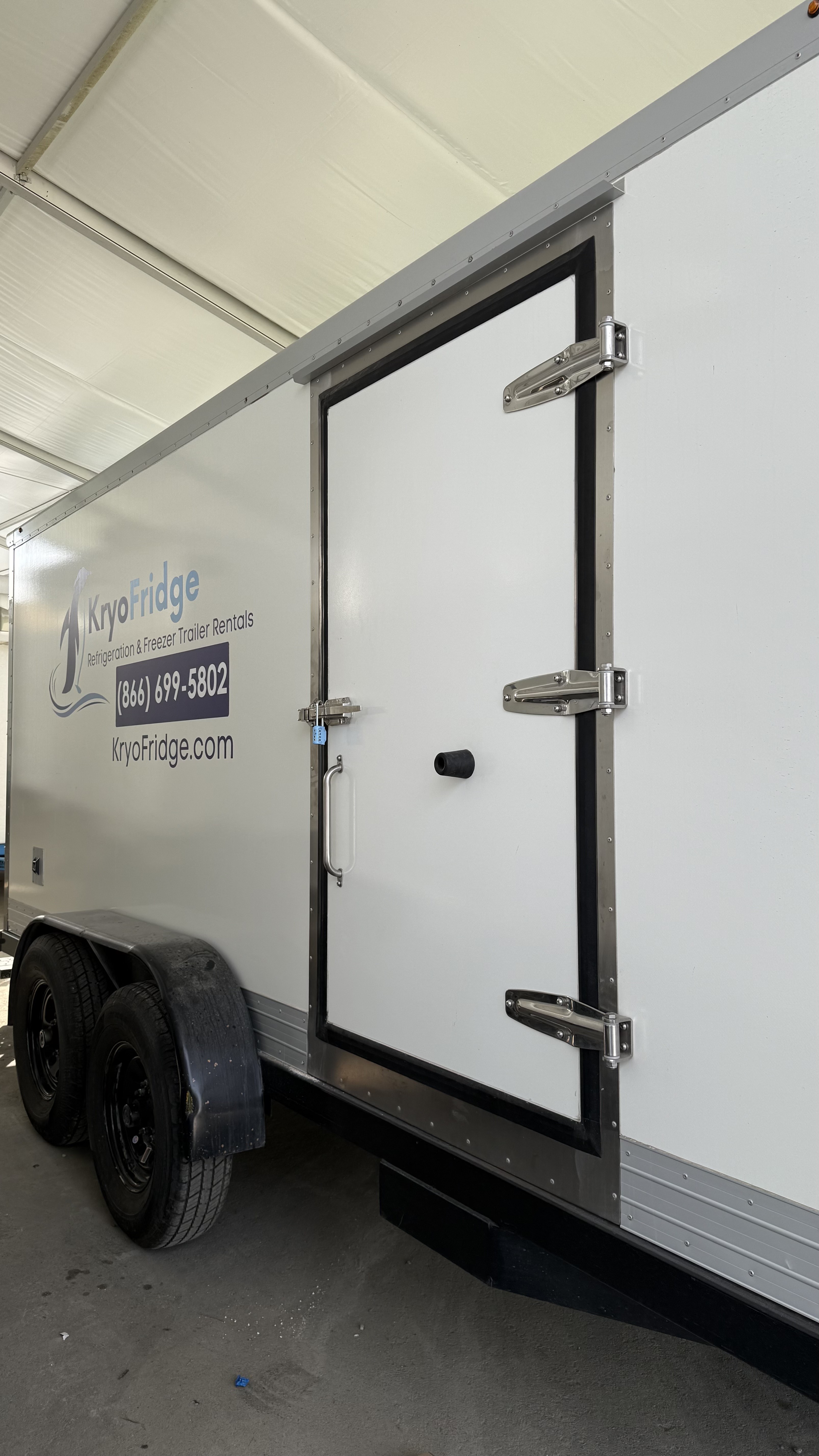 Close view of a clean KryoFridge freezer trailer insulated door and gasketed seal