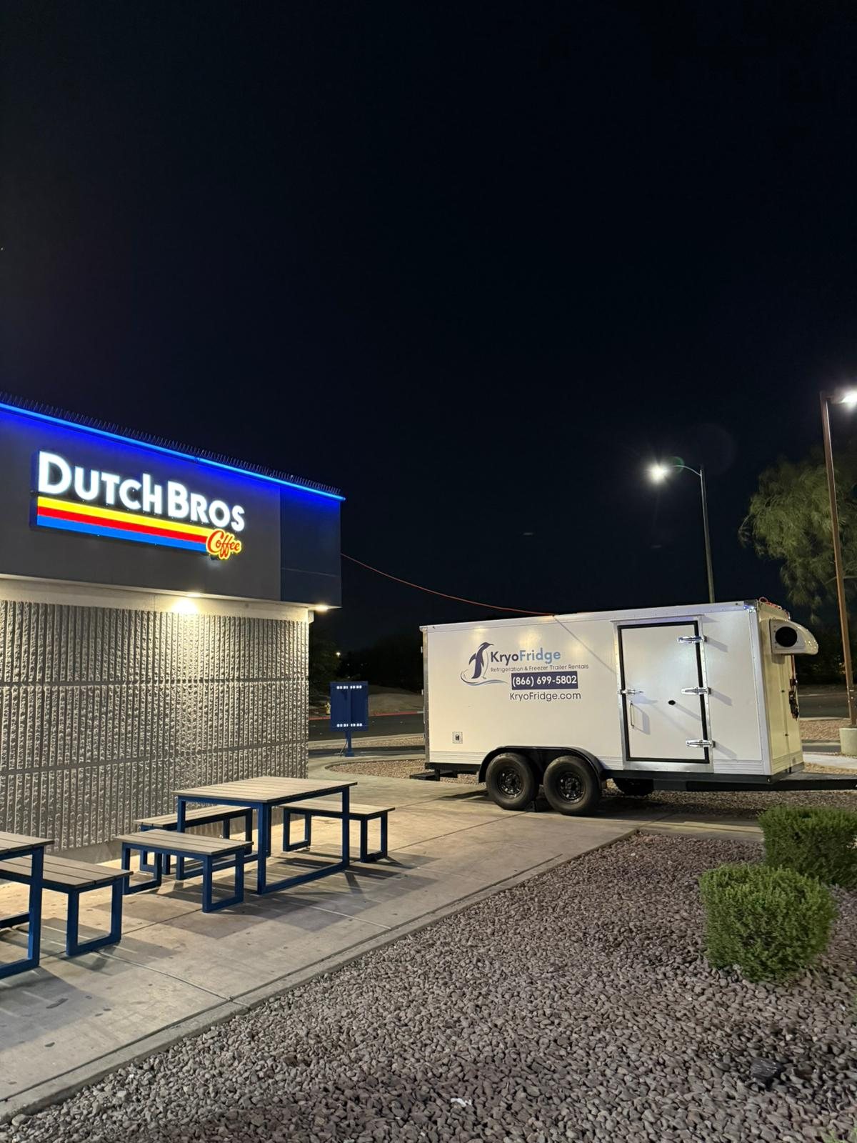 KryoFridge freezer trailer providing backup cold storage at a Dutch Bros Coffee location at night