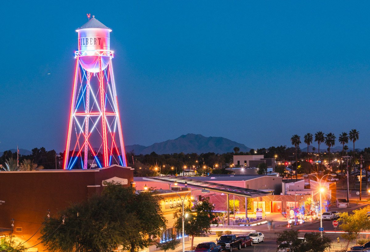 The historic 1927 Gilbert Water Tower lit up over the Heritage District in downtown Gilbert, Arizona