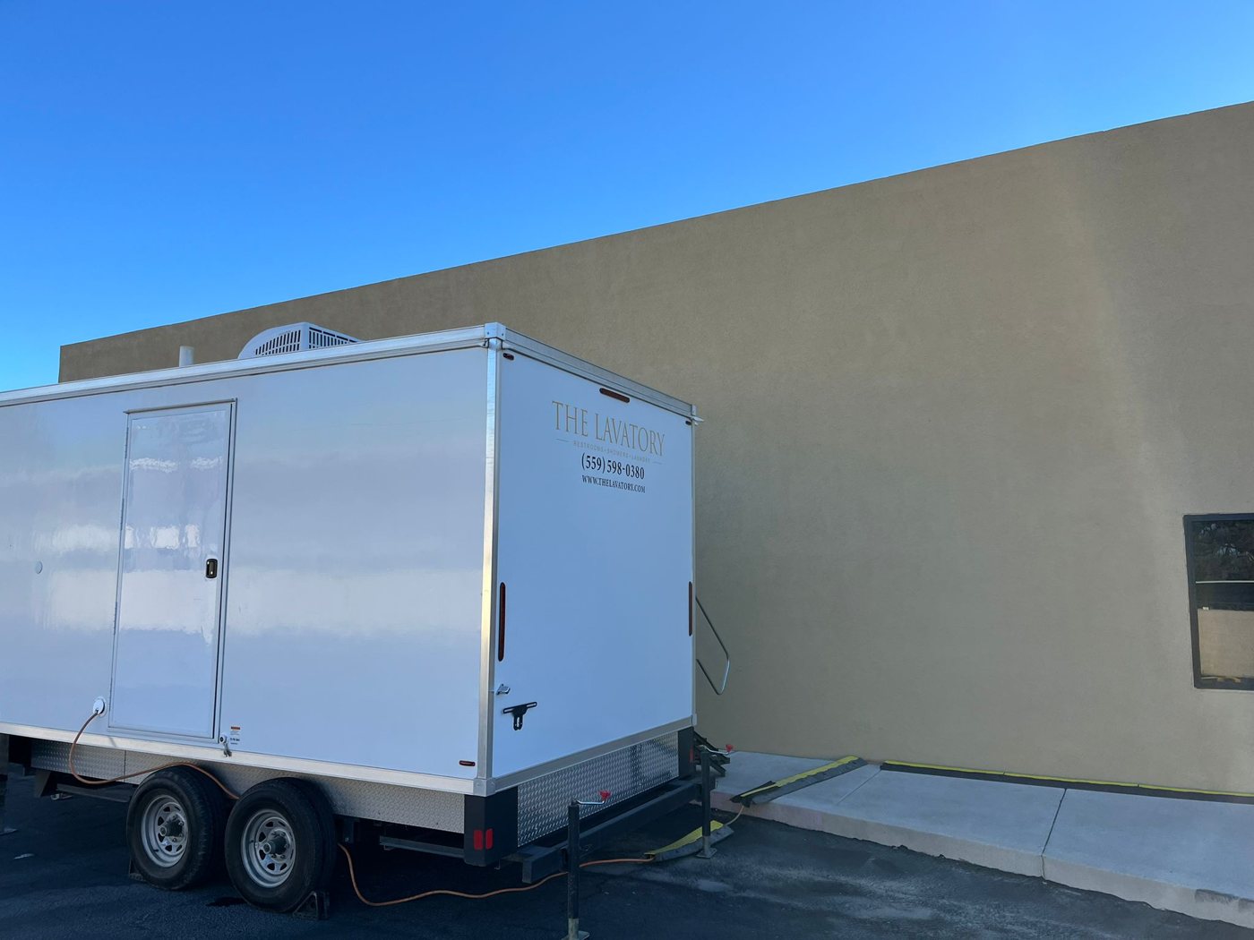 Clean white-and-blue KryoFridge reefer trailer side profile, sized to hold deep-freeze in Gilbert's desert heat
