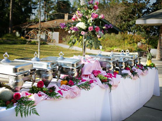 Outdoor catering buffet with chafing dishes and florals at a West Valley event that depends on on-site refrigeration