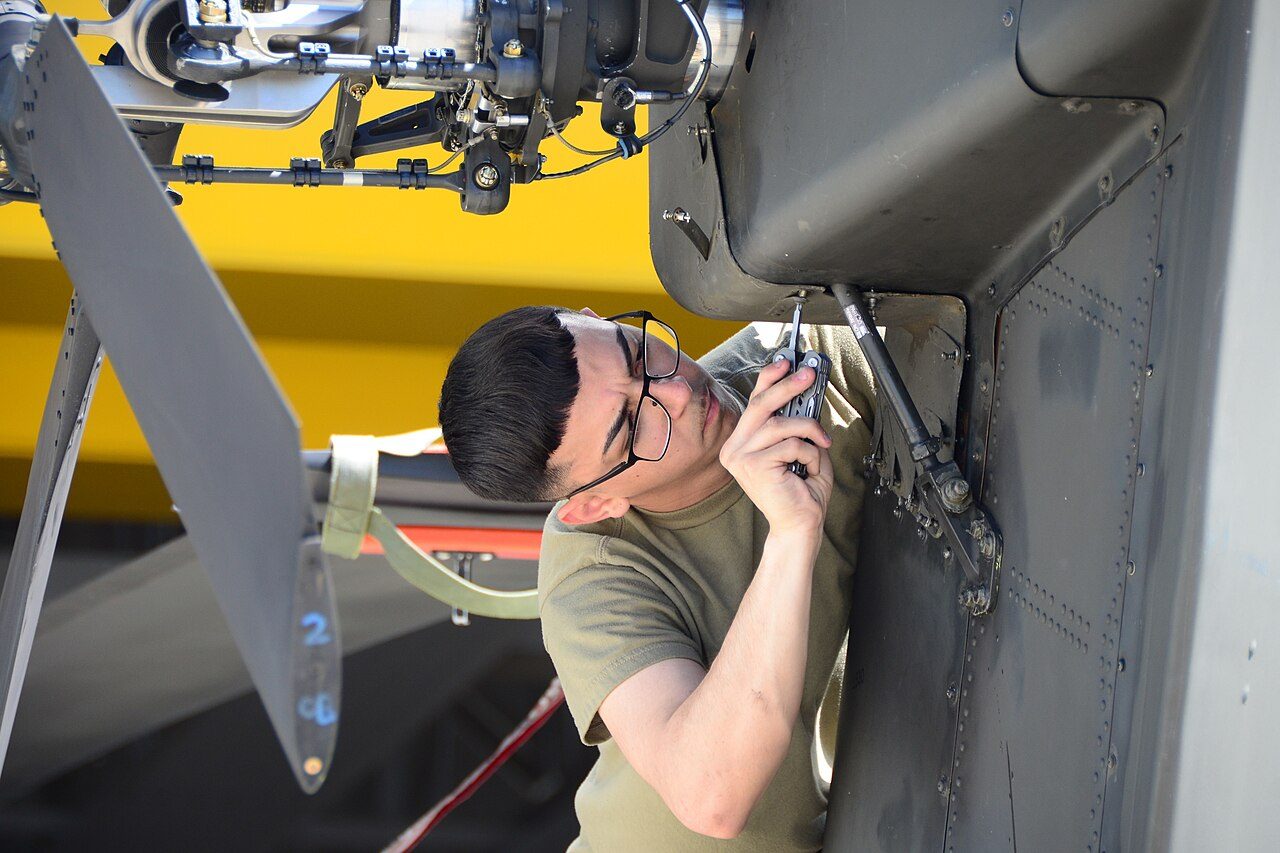 Aerospace technician working in Mesa's manufacturing corridor where food service and labs depend on cold storage