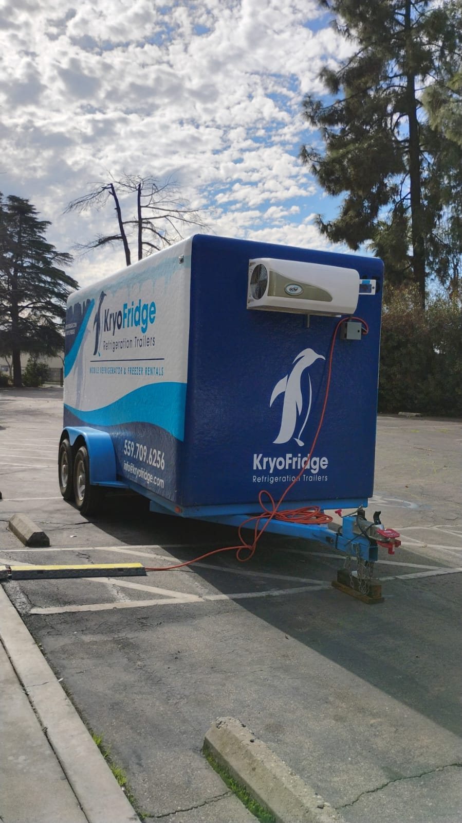 KryoFridge-branded freezer trailer with penguin logo, owned and operated directly for Phoenix cold-storage jobs