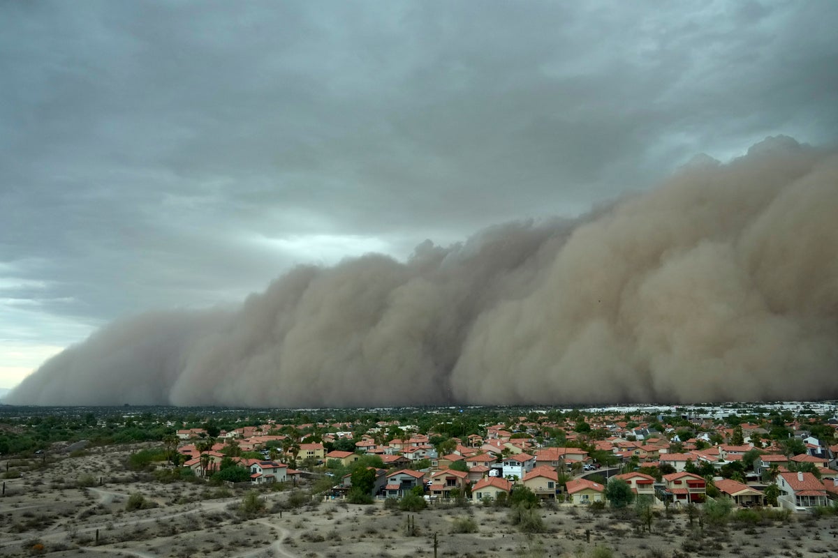 A towering haboob dust storm rolling across the desert toward a Scottsdale-area city, the kind of monsoon event that knocks out power