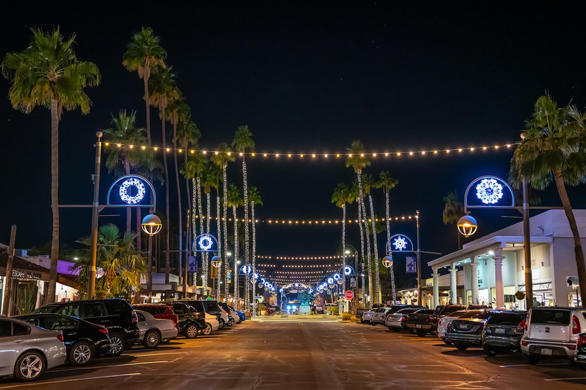 Old Town Scottsdale entertainment district at night with string lights, restaurants and bars