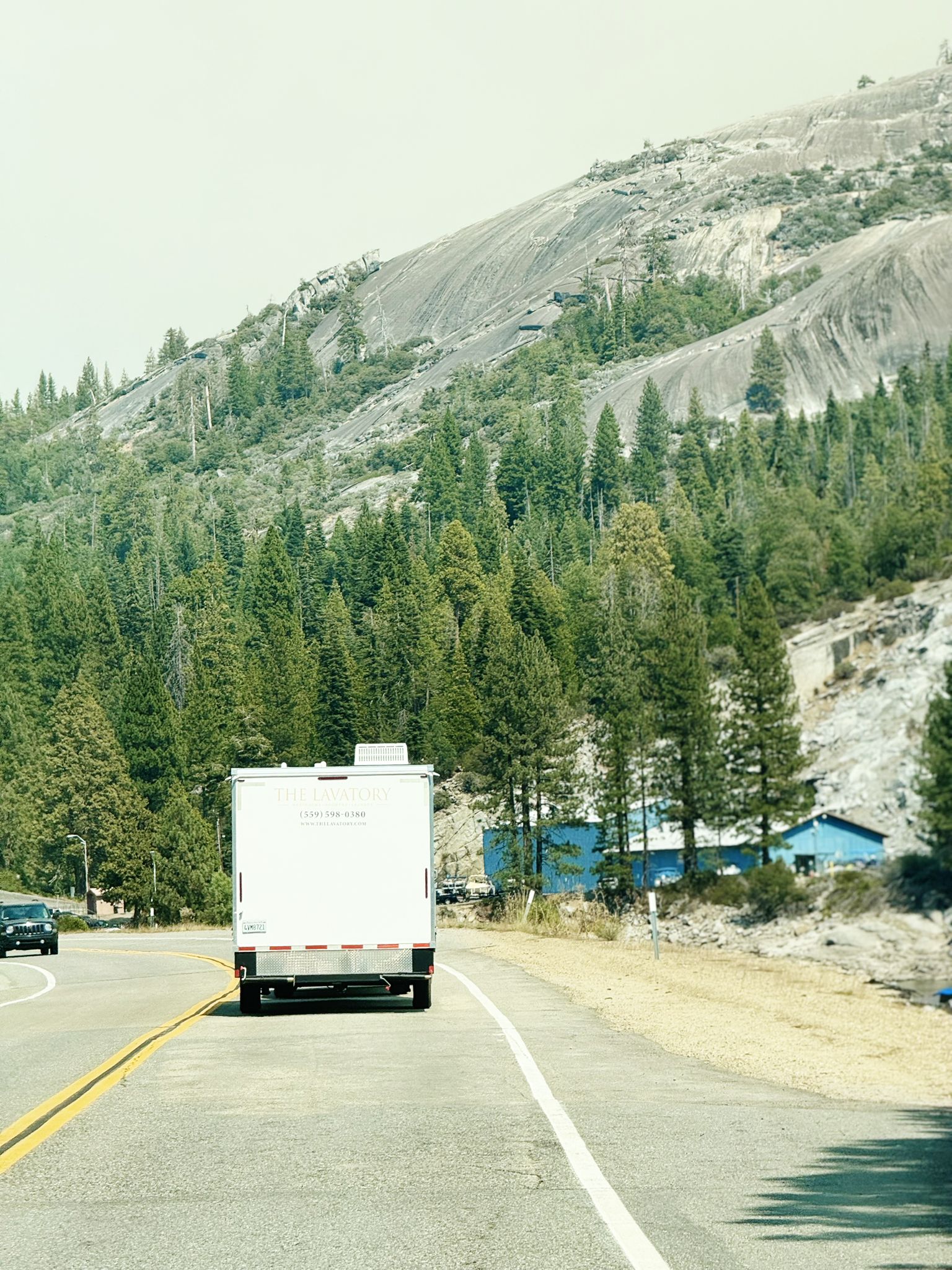 KryoFridge freezer trailer being towed in transit for a delivery