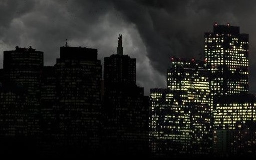 Tucson skyline darkened during a power outage, the kind of grid event that takes every walk-in offline at once
