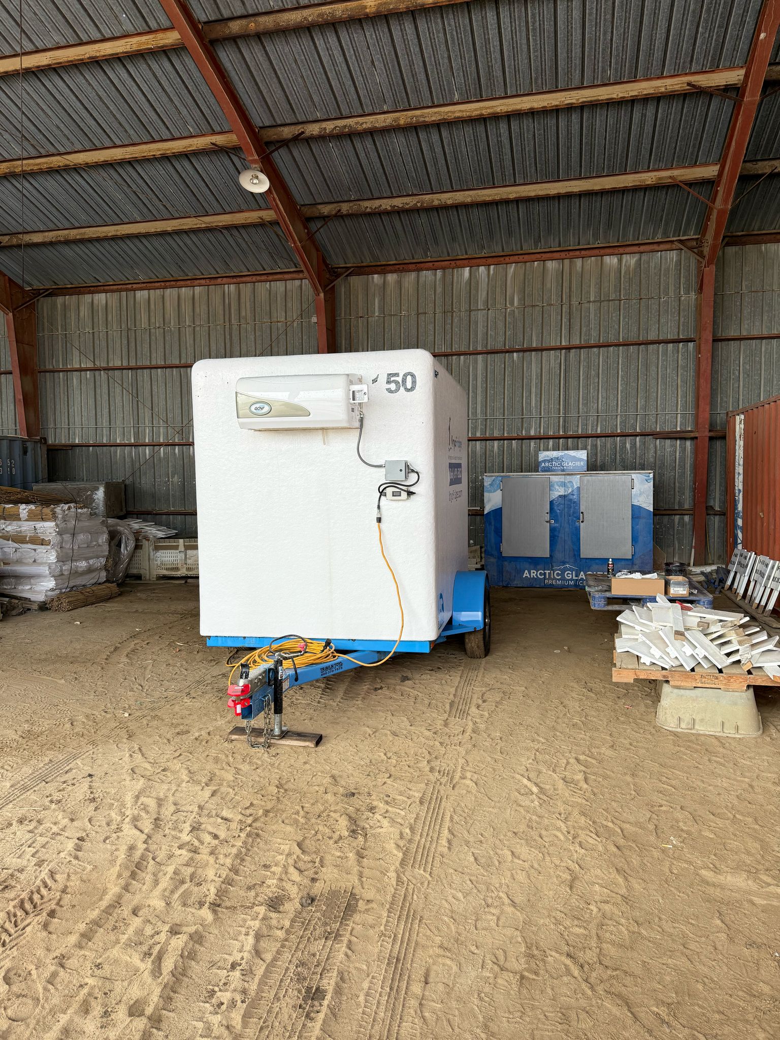 KryoFridge freezer trailer positioned at a loading dock to hold frozen product for a large operation