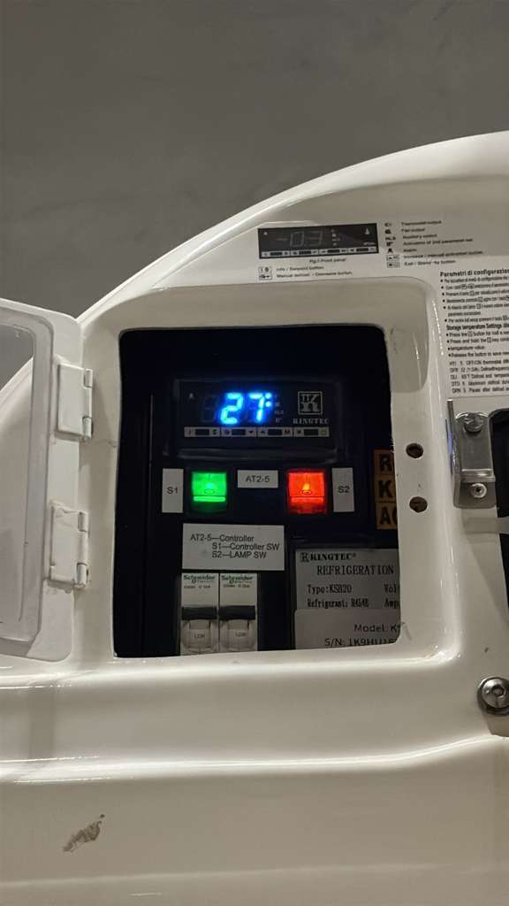 Close view of a KryoFridge trailer's digital set-point control panel, which holds the chosen temperature on a dedicated circuit or generator