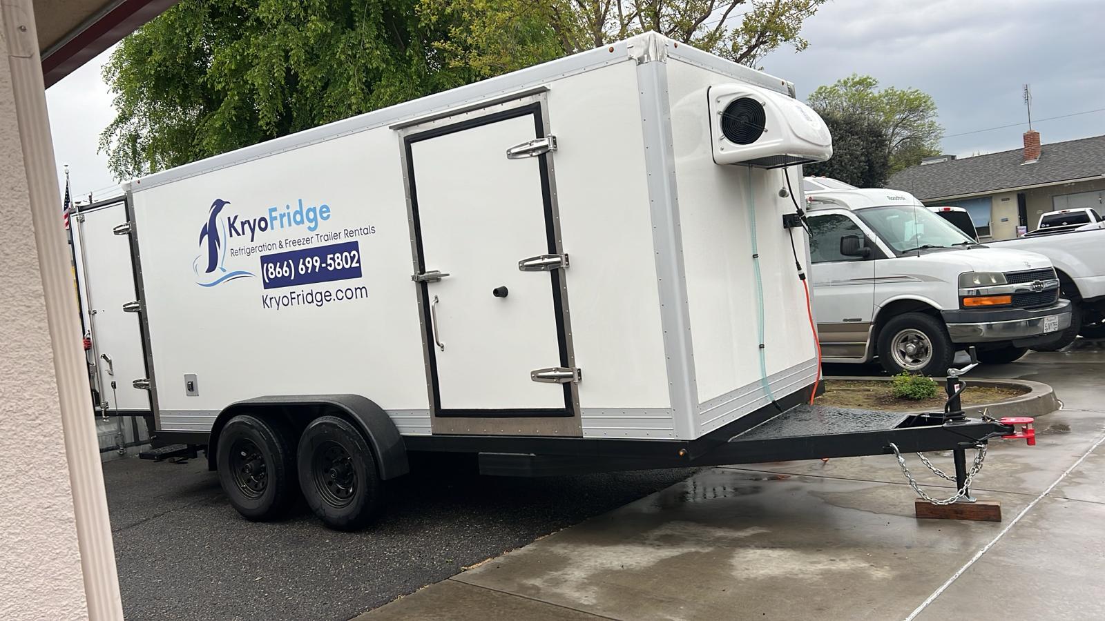 Large KryoFridge-branded blue-and-white refrigeration trailer parked and ready for a Garden Grove cold-storage job
