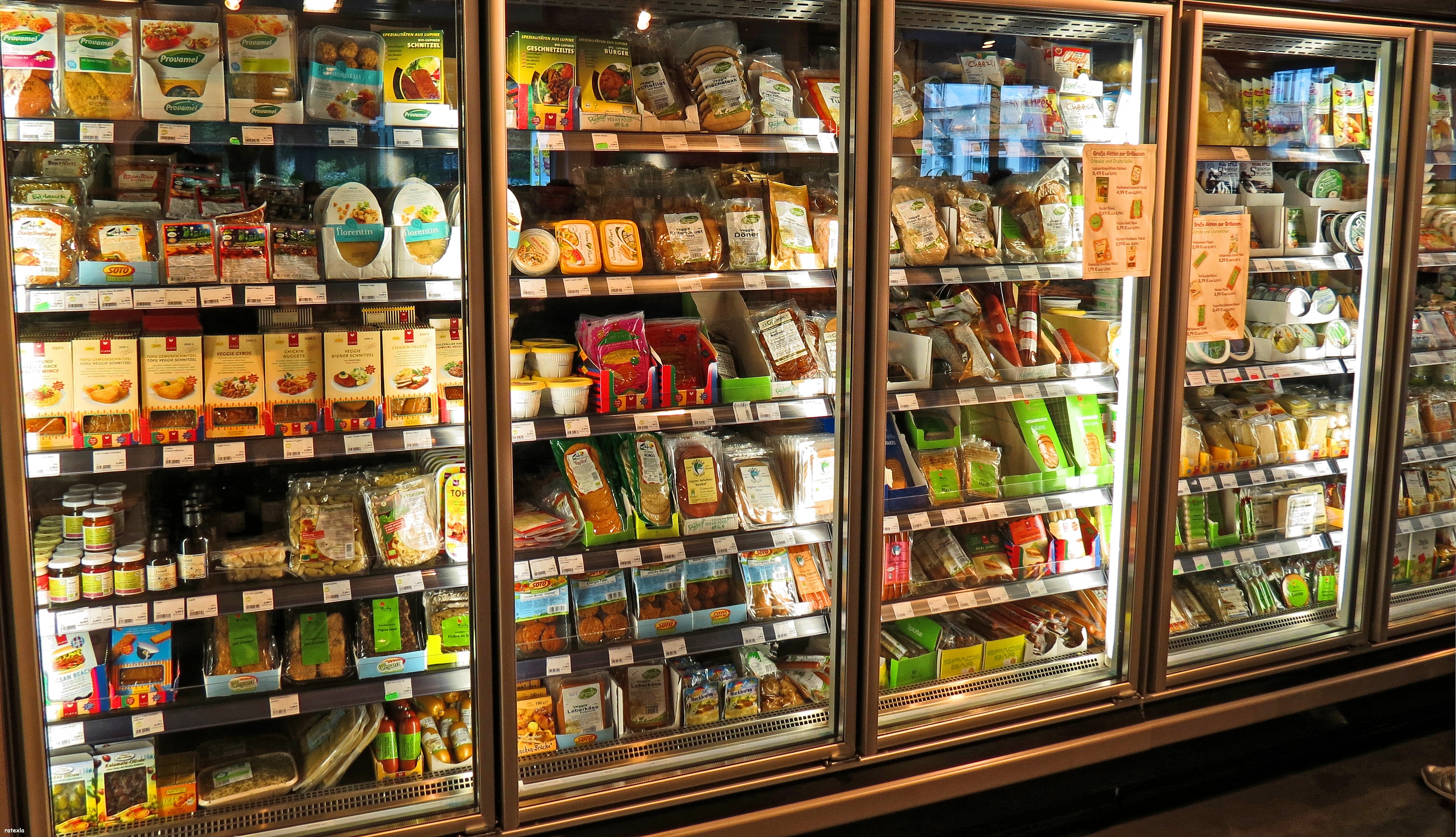 Stocked refrigerated grocery cases that depend on backup cold storage during an Inland Empire outage
