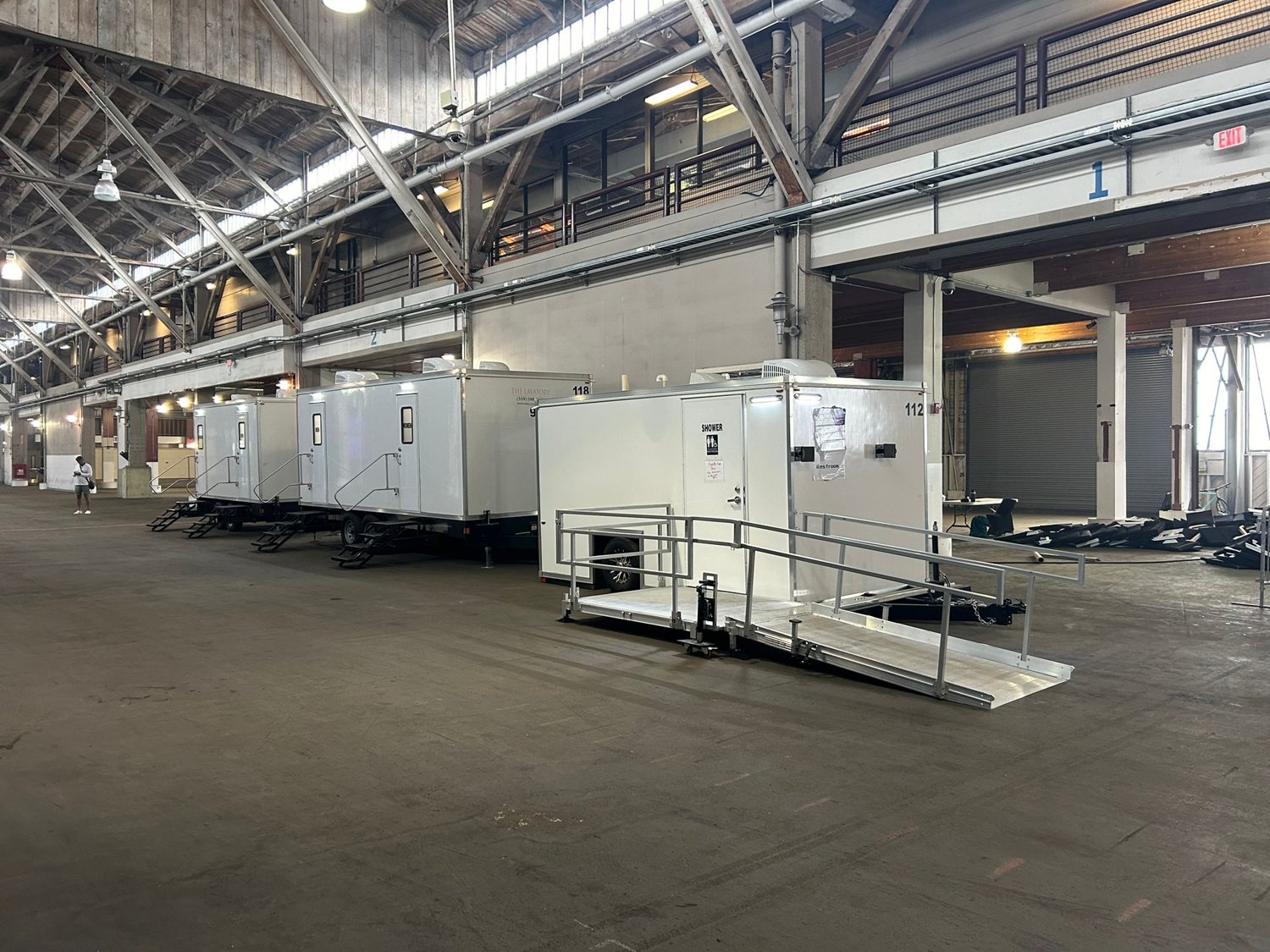 A lineup of multiple KryoFridge cold-storage trailers staged together for a large operation