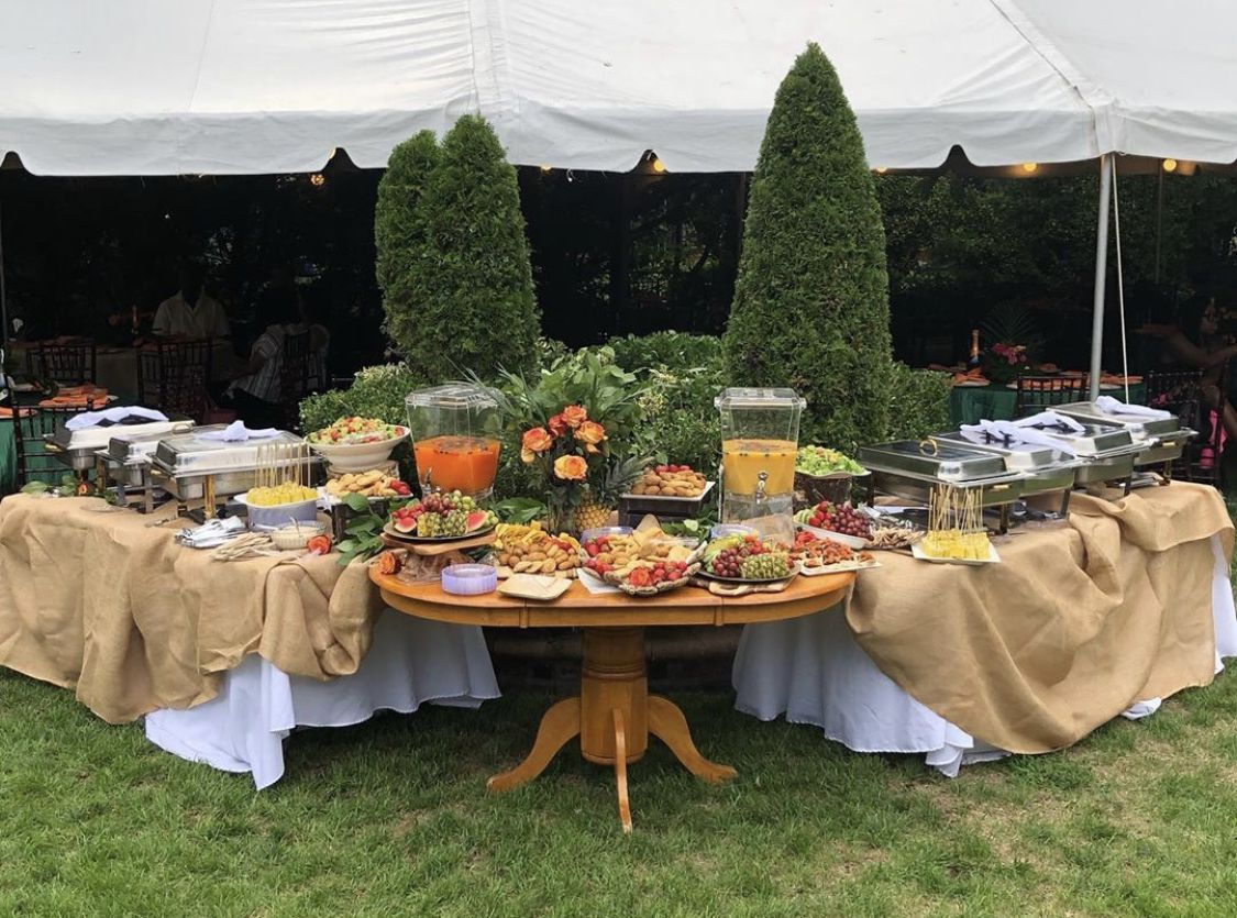 Outdoor Santa Clarita event with catering tents that rely on an on-site freezer trailer rental for cold holding