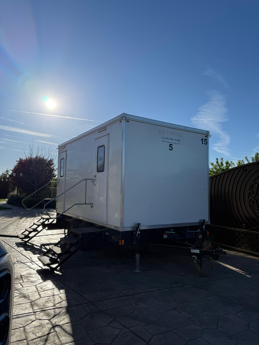 Clean white-and-blue KryoFridge freezer trailer side profile available to rent in Sunnyvale