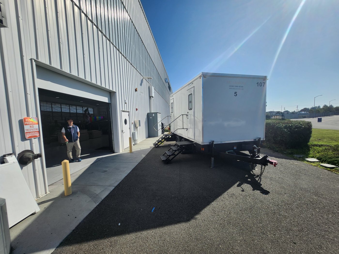 White KryoFridge freezer trailer staged on a commercial lot in Temecula, side view