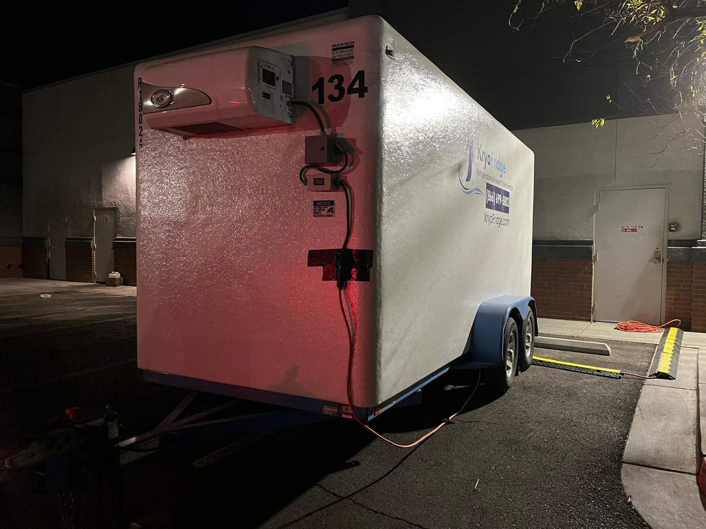 Multiple KryoFridge freezer and refrigerated trailers lined up in a staging yard