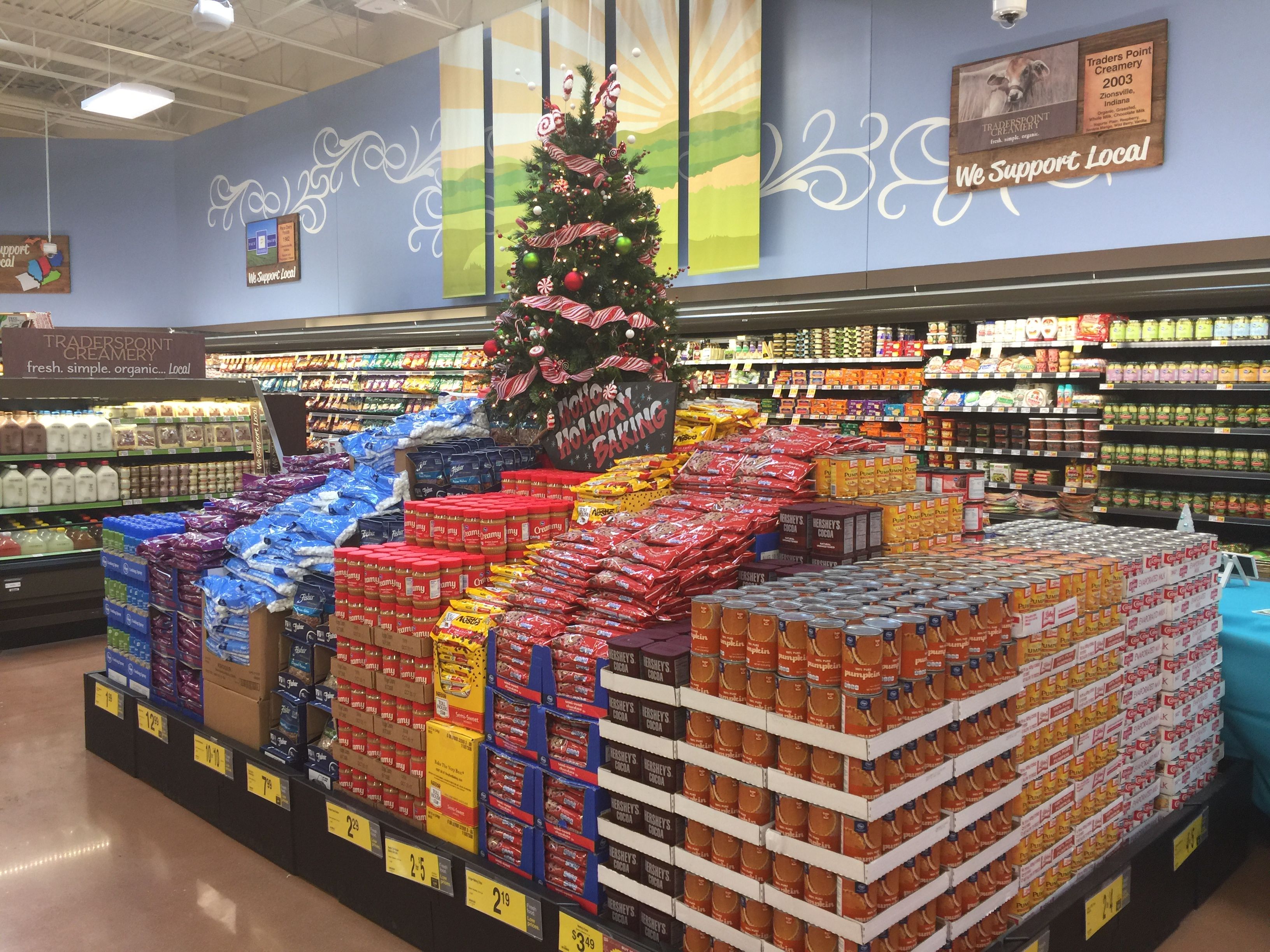Grocery store produce aisle fully stocked for a holiday seasonal surge supported by refrigerated trailer cold storage