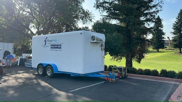 KryoFridge freezer and refrigeration trailer staged on a Salinas Valley produce lot for same-day cold storage