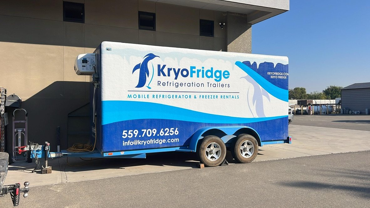 KryoFridge freezer trailer rental parked on a West Jordan commercial lot in the southwestern Salt Lake Valley for same-day cold storage