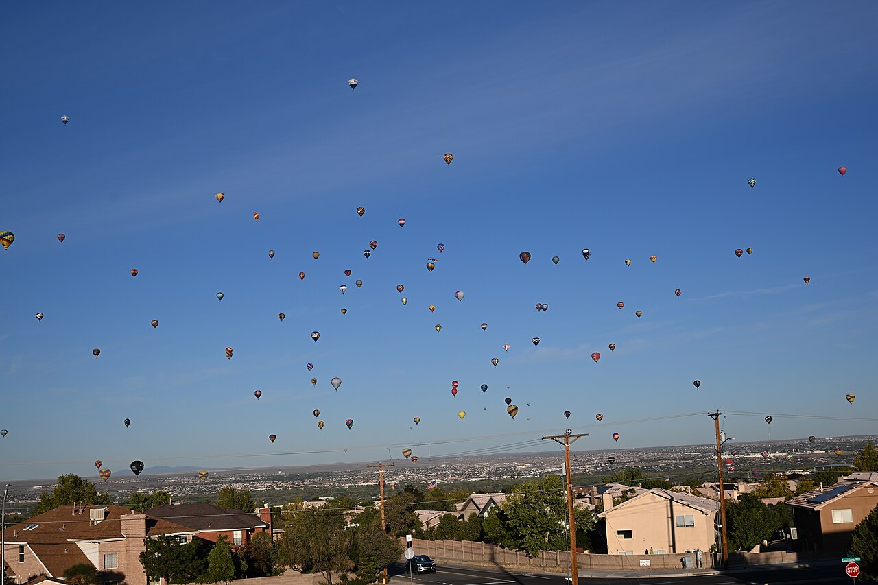 Hundreds of hot air balloons rising over an Albuquerque neighborhood during the International Balloon Fiesta, a signature event that needs vendor cold storage