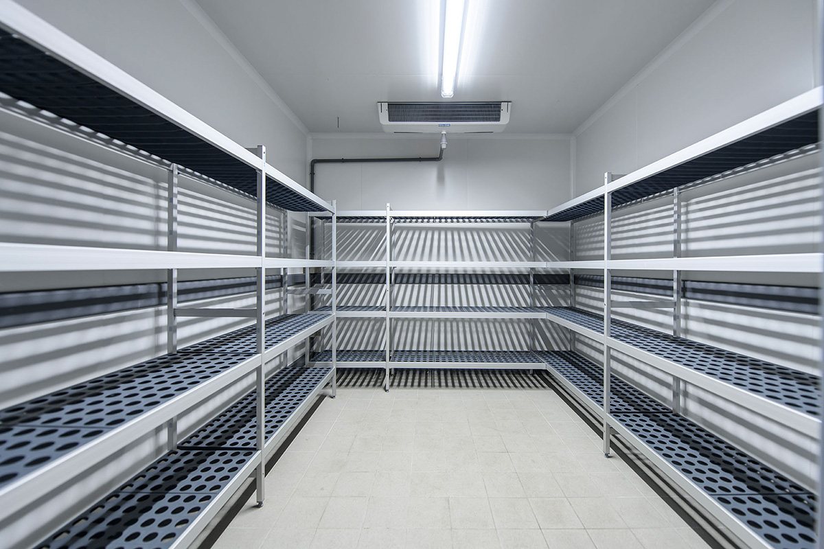 KryoFridge freezer trailer interior with food-safe shelving ready for a Sandy restaurant walk-in