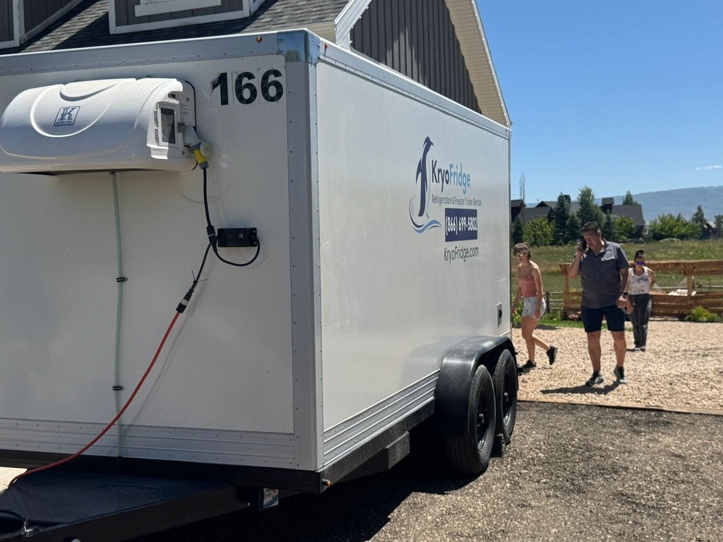 KryoFridge freezer trailer plugged in and holding temperature on a Santa Ana job site