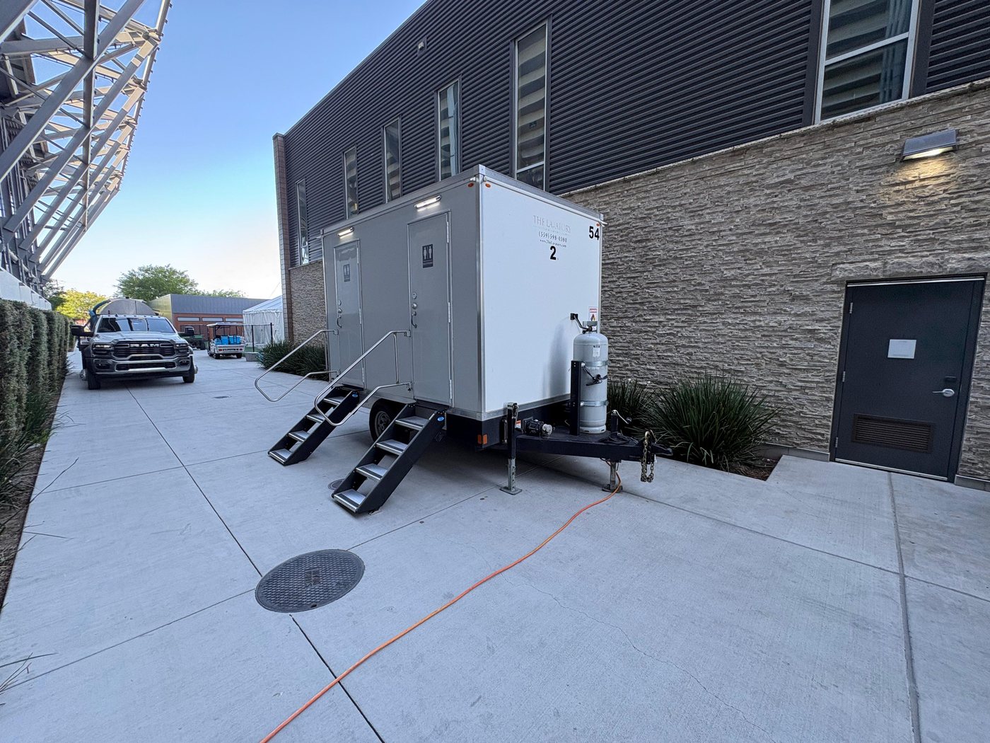 KryoFridge freezer trailer positioned on a pad during a night-time emergency cold-storage call