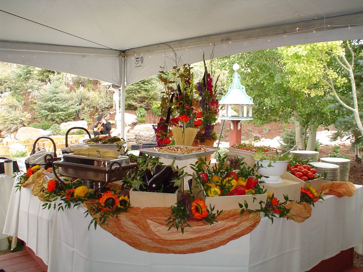 Outdoor catering setup at a Visalia downtown festival supported by a rented KryoFridge refrigeration trailer
