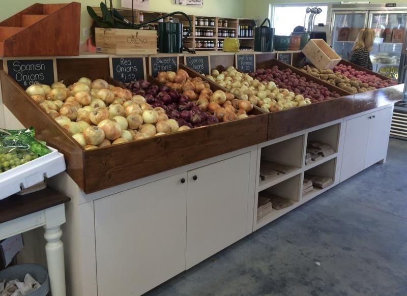 KryoFridge refrigeration trailer holding produce and dairy overflow behind a Visalia grocery store