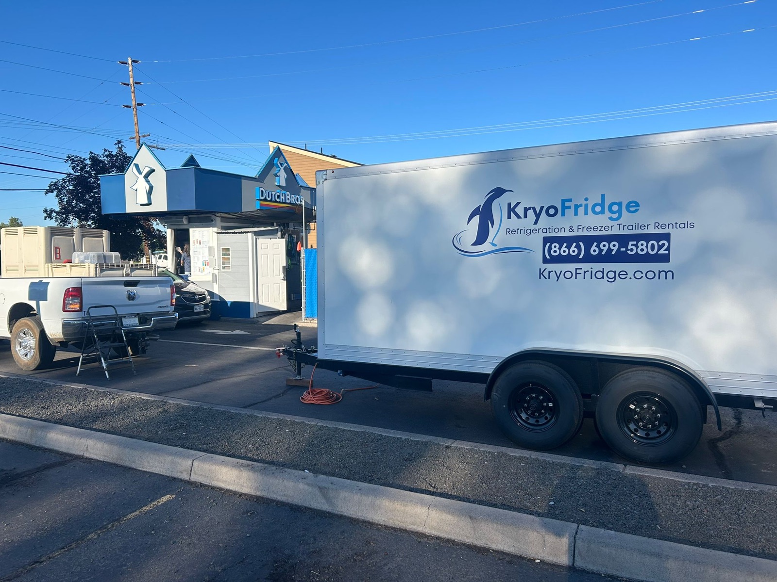 KryoFridge 16' Freezer Trailer parked at a restaurant back lot