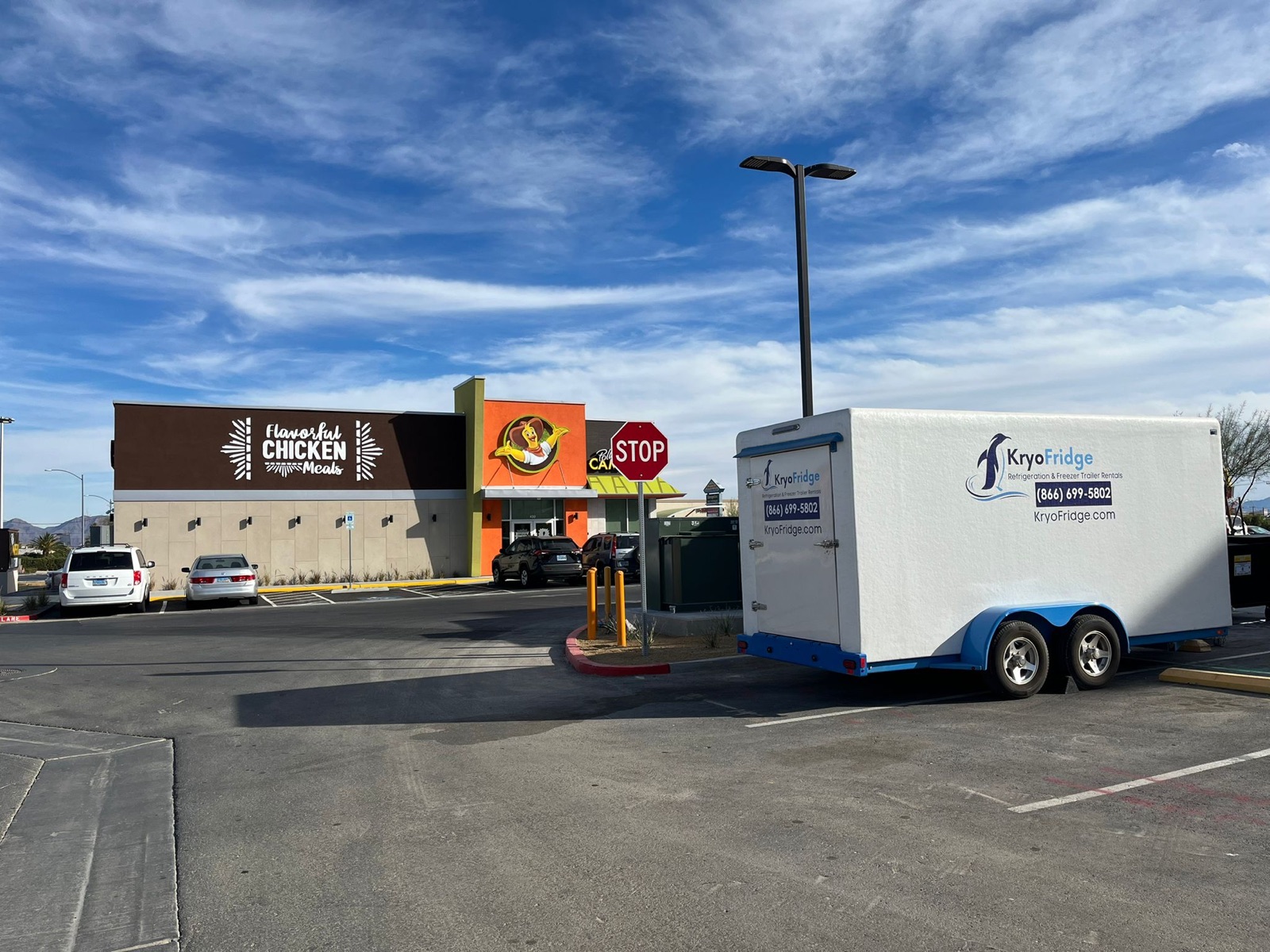 KryoFridge 8' Freezer Trailer parked at a restaurant back lot