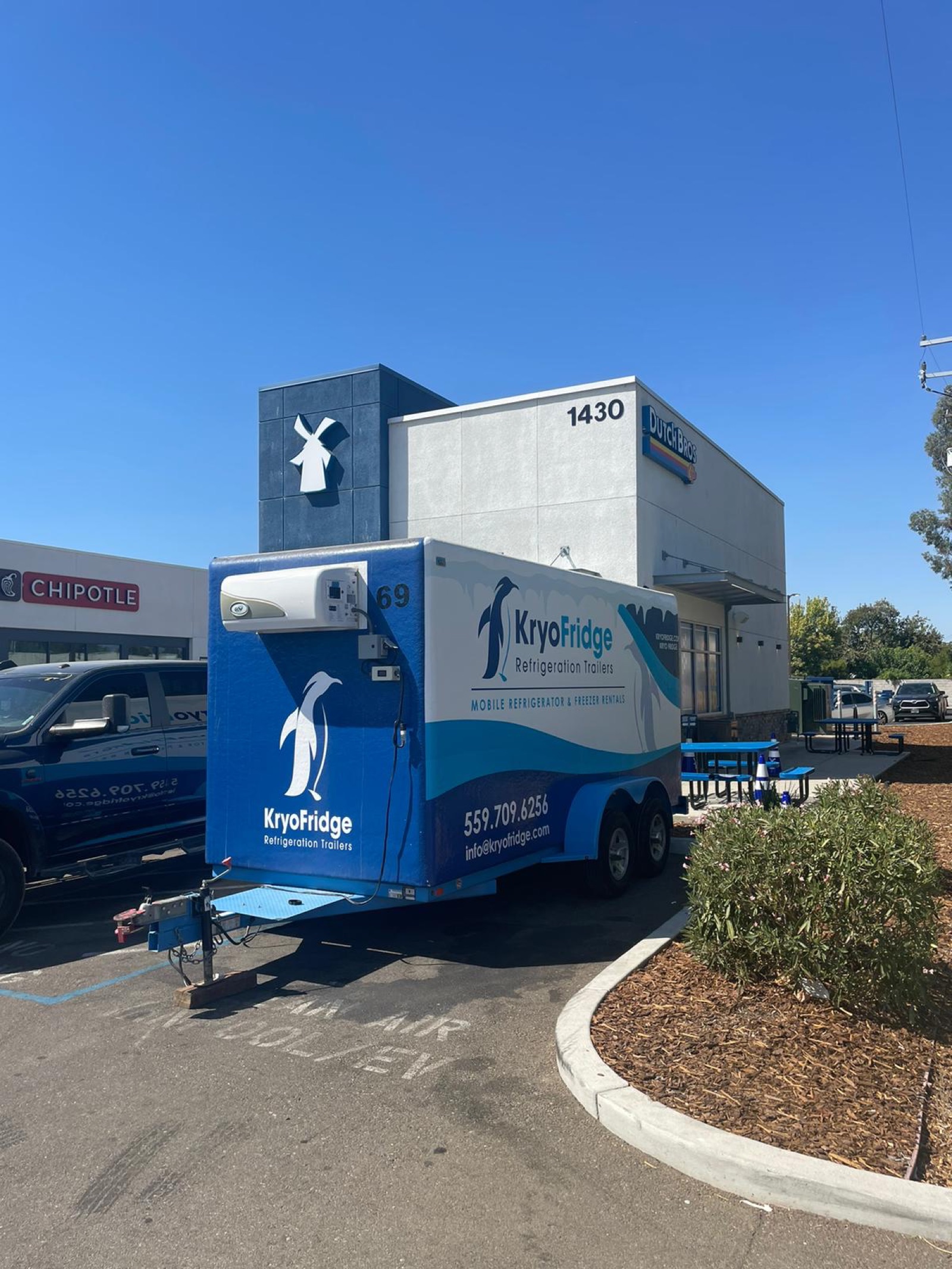 KryoFridge 8' Freezer Trailer parked at a restaurant back lot