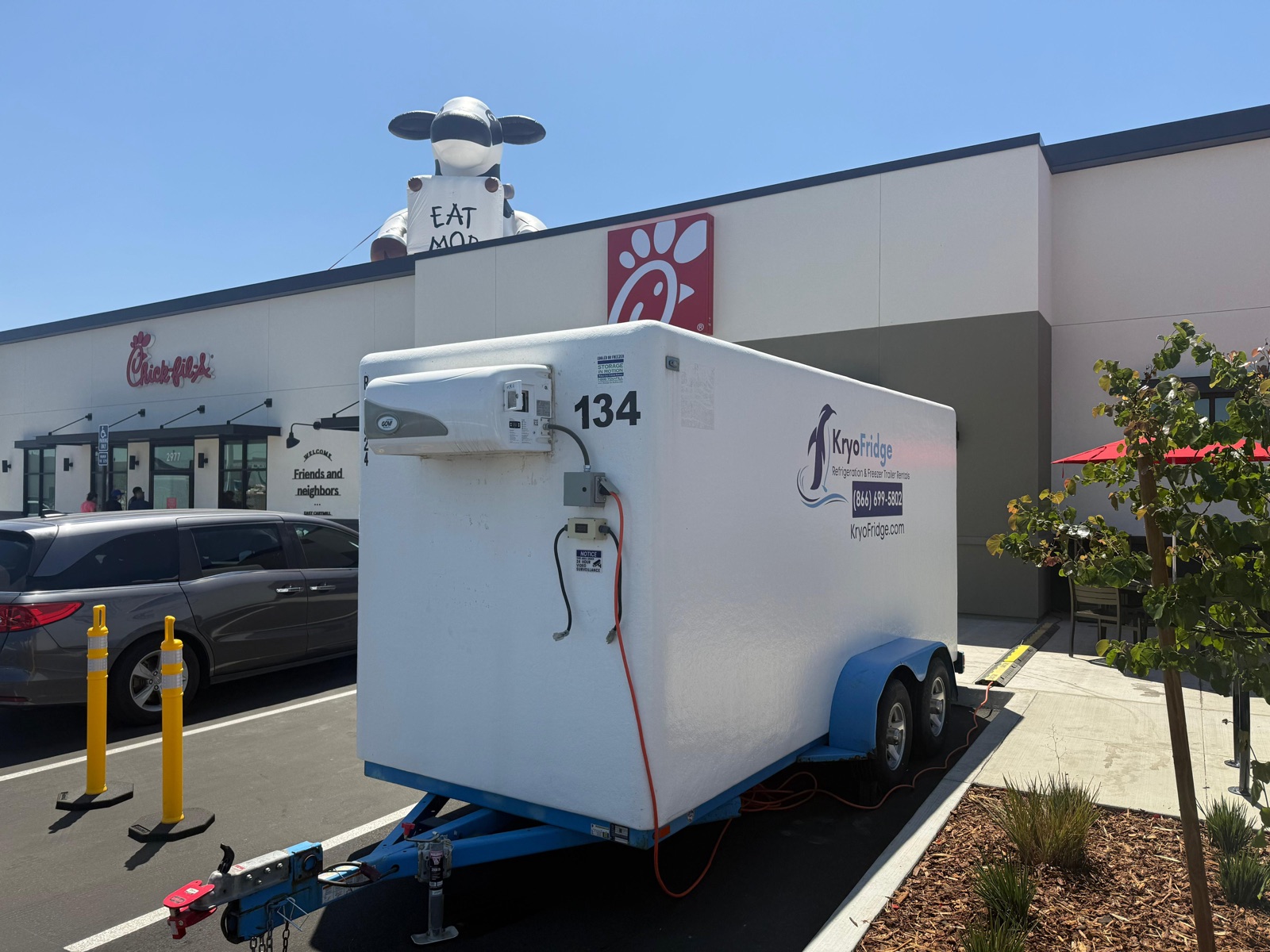 KryoFridge 8' Freezer Trailer parked at a restaurant back lot