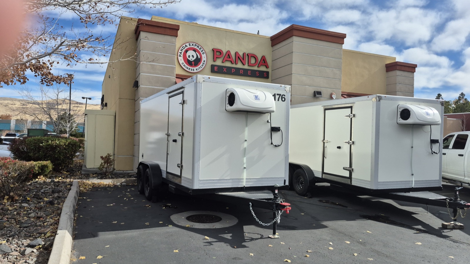 KryoFridge 8' Freezer Trailer parked at a restaurant back lot