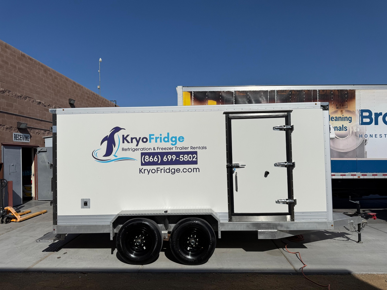 KryoFridge 8' Freezer Trailer on an industrial yard