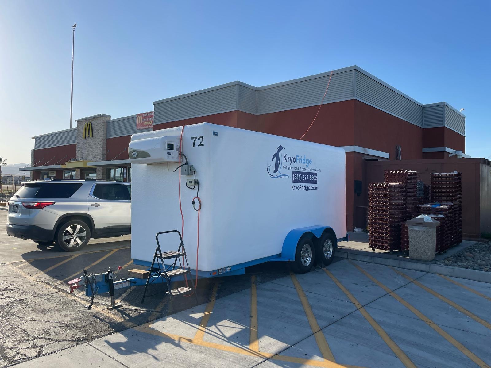 KryoFridge Refrigeration Trailer parked at a restaurant back lot