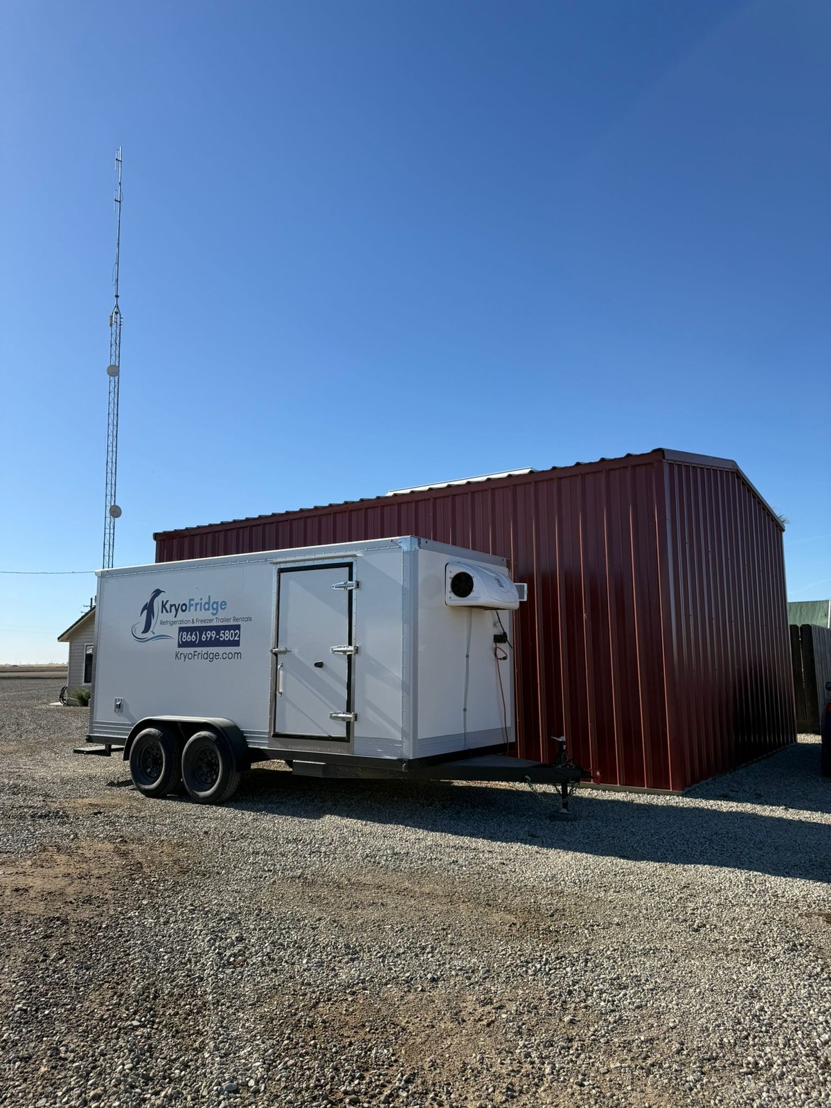 A plugged-in KryoFridge mobile cold storage unit supporting Pantry drives before Thanksgiving in Mesquite